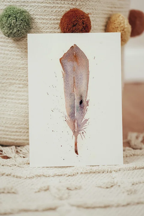Image of a feather watercolor painting by Shayna Larsen, originals & prints available