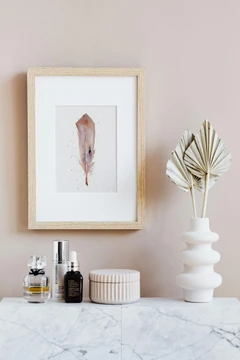 Image of a feather watercolor painting by Shayna Larsen, originals & prints available