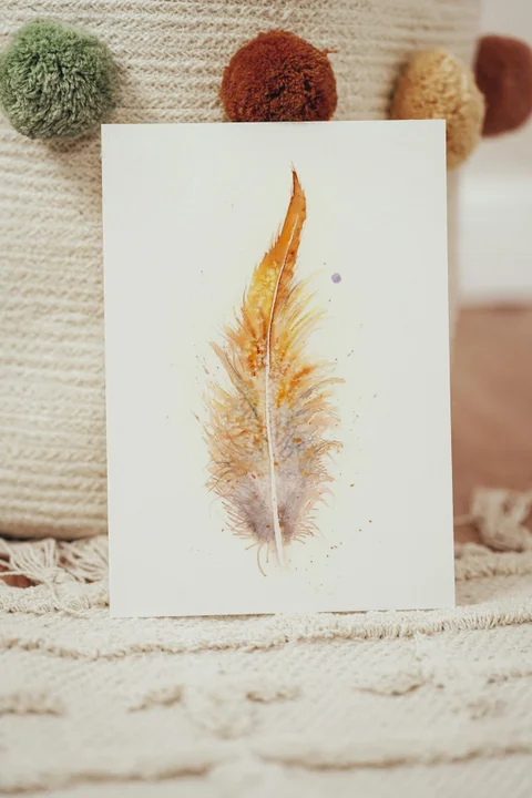 Image of a feather watercolor painting by Shayna Larsen, originals & prints available