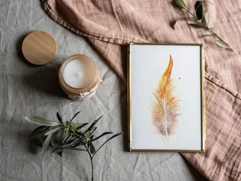 Image of a feather watercolor painting by Shayna Larsen, originals & prints available