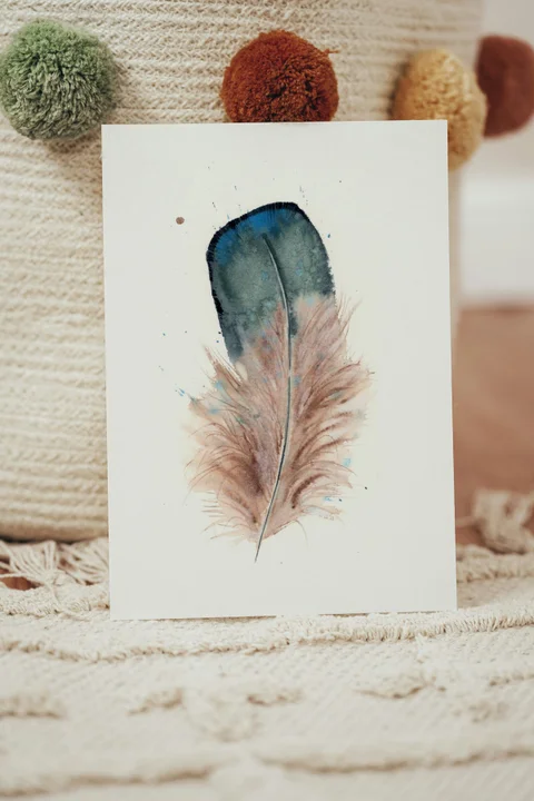 Image of a feather watercolor painting by Shayna Larsen, originals & prints available