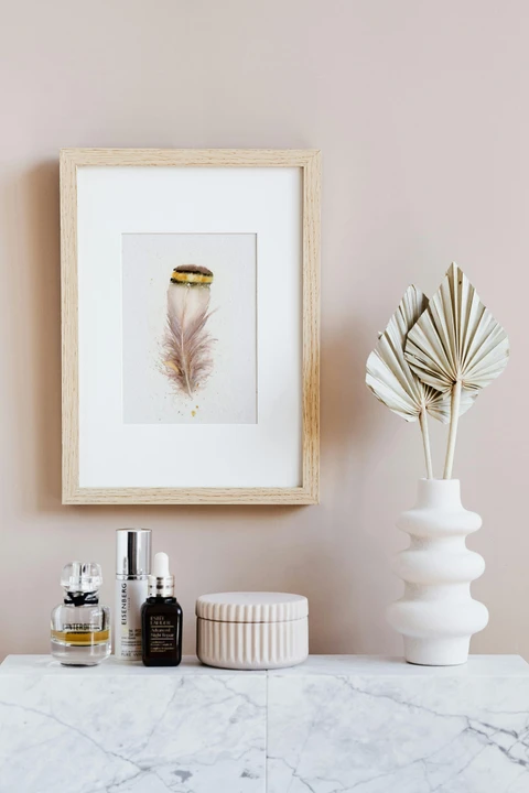 Image of a feather watercolor painting by Shayna Larsen, originals & prints available