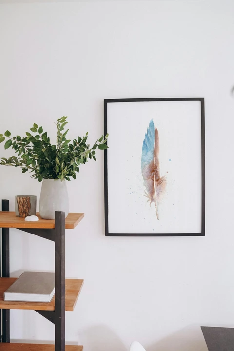 Image of a feather watercolor painting by Shayna Larsen, originals & prints available