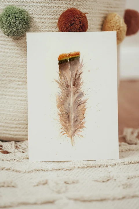 Image of a feather watercolor painting by Shayna Larsen, originals & prints available