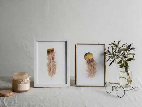 Image of a feather watercolor painting by Shayna Larsen, originals & prints available