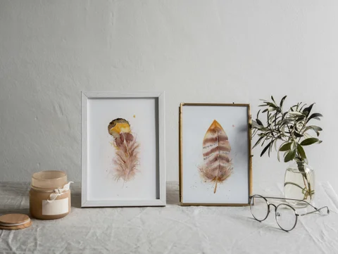 Image of a feather watercolor painting by Shayna Larsen, originals & prints available