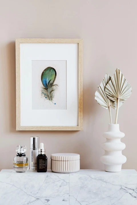 Image of a feather watercolor painting by Shayna Larsen, originals & prints available