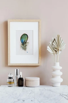Image of a feather watercolor painting by Shayna Larsen, originals & prints available