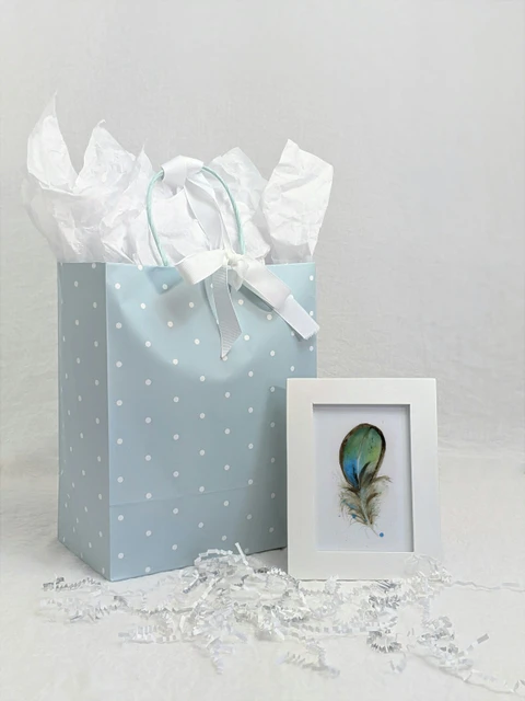 Image of a feather watercolor painting by Shayna Larsen, originals & prints available