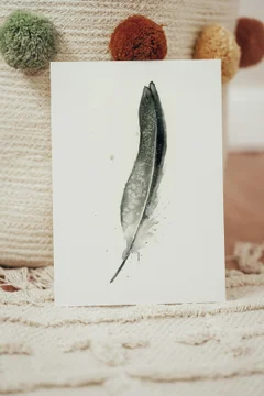 Image of a feather watercolor painting by Shayna Larsen, originals & prints available