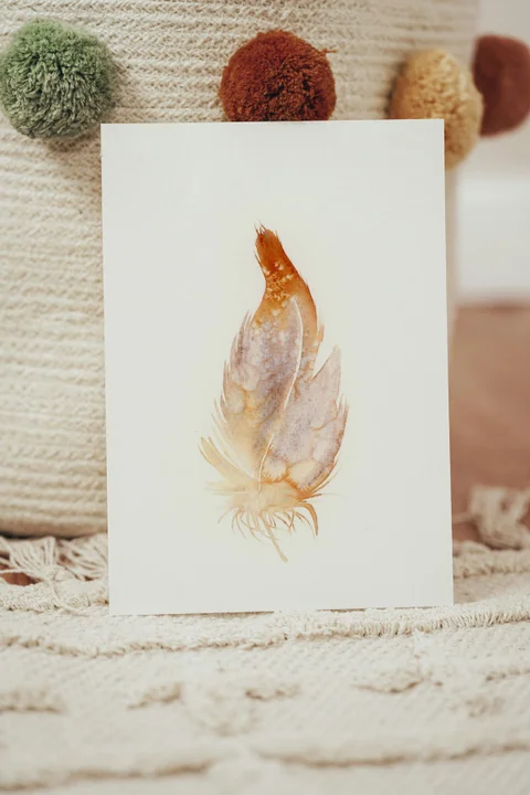 Image of a feather watercolor painting by Shayna Larsen, originals & prints available