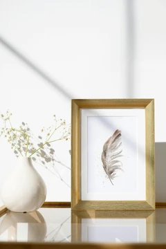 Image of a feather watercolor painting by Shayna Larsen, originals & prints available