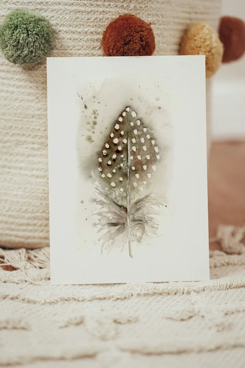 Image of a feather watercolor painting by Shayna Larsen, originals & prints available
