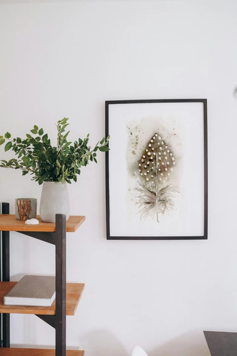 Image of a feather watercolor painting by Shayna Larsen, originals & prints available