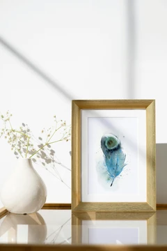 Image of a feather watercolor painting by Shayna Larsen, originals & prints available