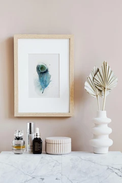 Image of a feather watercolor painting by Shayna Larsen, originals & prints available