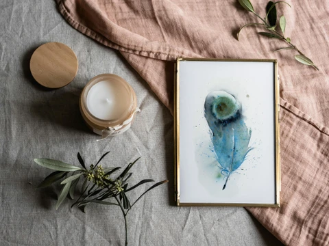 Image of a feather watercolor painting by Shayna Larsen, originals & prints available