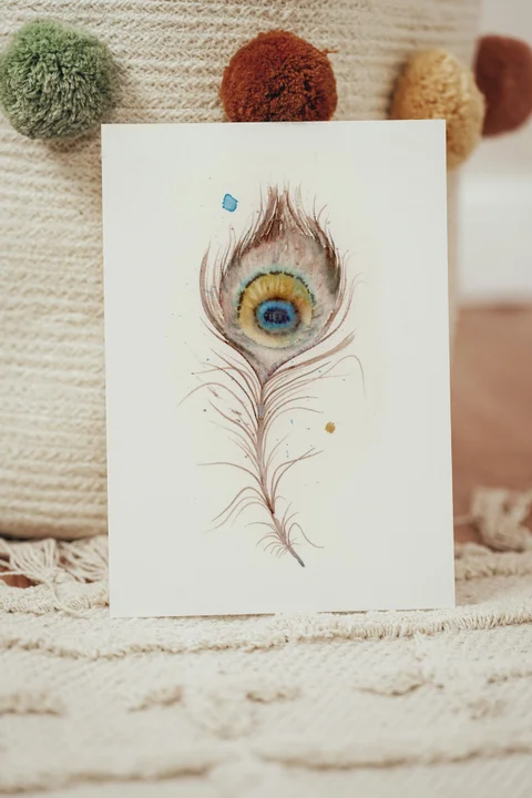 Image of a feather watercolor painting by Shayna Larsen, originals & prints available