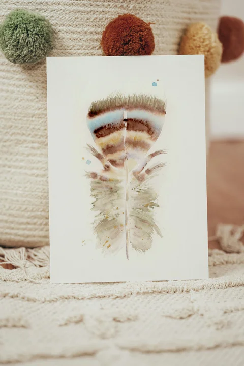 Image of a feather watercolor painting by Shayna Larsen, originals & prints available