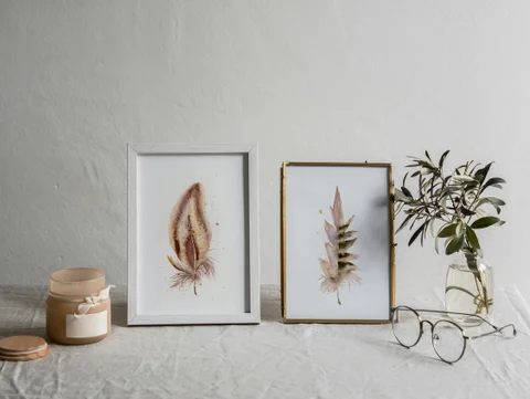 Image of a feather watercolor painting by Shayna Larsen, originals & prints available