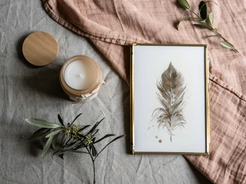 Image of a feather watercolor painting by Shayna Larsen, originals & prints available