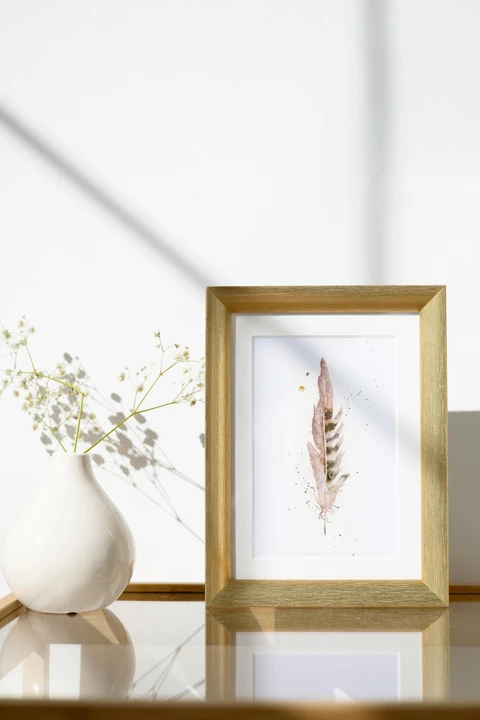 Image of a feather watercolor painting by Shayna Larsen, originals & prints available