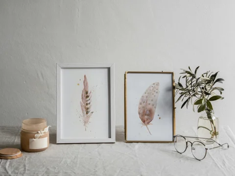 Image of a feather watercolor painting by Shayna Larsen, originals & prints available