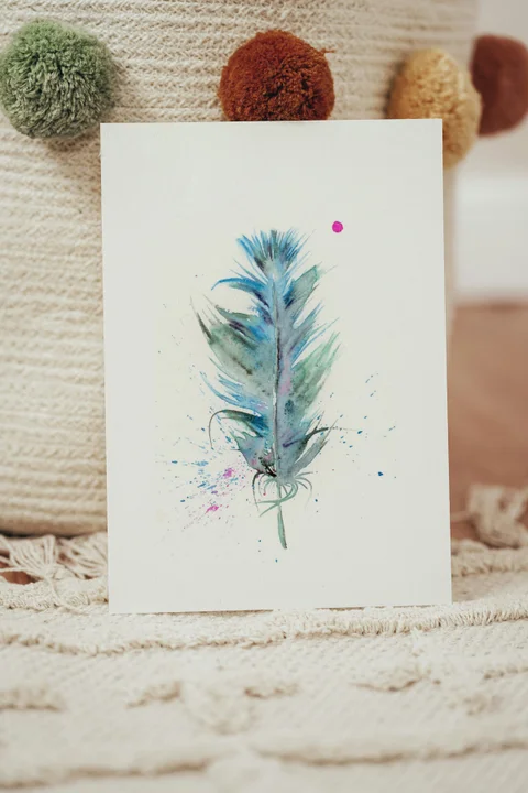 Image of a feather watercolor painting by Shayna Larsen, originals & prints available
