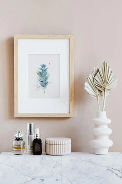 Image of a feather watercolor painting by Shayna Larsen, originals & prints available