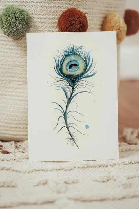 Image of a feather watercolor painting by Shayna Larsen, originals & prints available