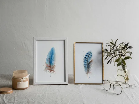 Image of a feather watercolor painting by Shayna Larsen, originals & prints available