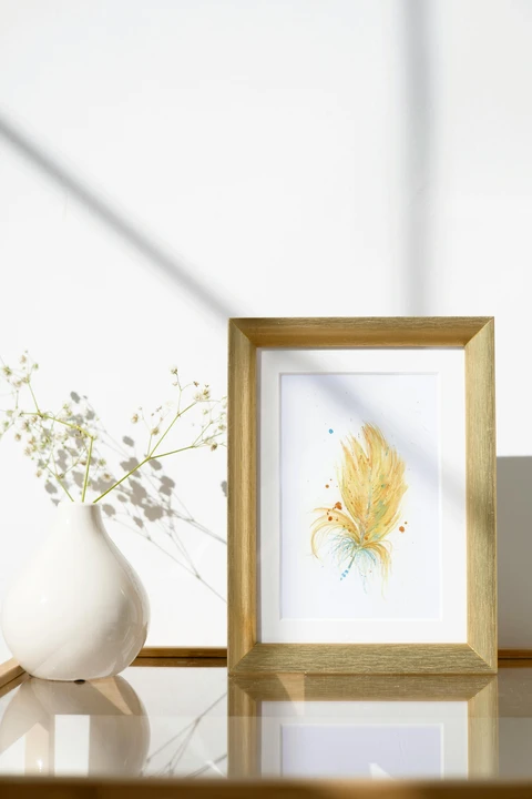 Image of a feather watercolor painting by Shayna Larsen, originals & prints available