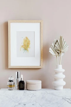 Image of a feather watercolor painting by Shayna Larsen, originals & prints available