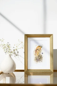 Image of a feather watercolor painting by Shayna Larsen, originals & prints available