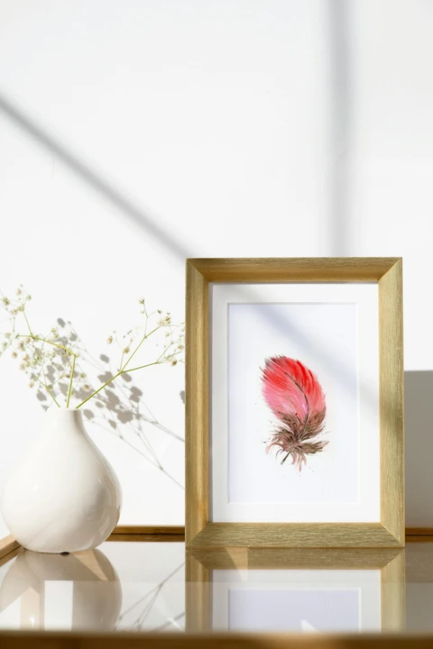 Image of a feather watercolor painting by Shayna Larsen, originals & prints available