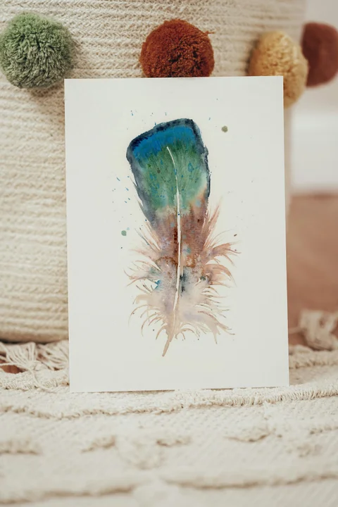 Image of a feather watercolor painting by Shayna Larsen, originals & prints available