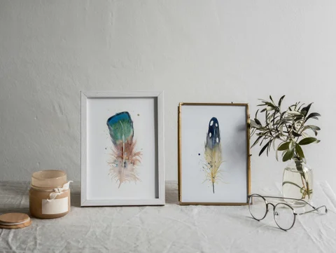 Image of a feather watercolor painting by Shayna Larsen, originals & prints available