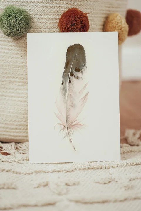 Image of a feather watercolor painting by Shayna Larsen, originals & prints available