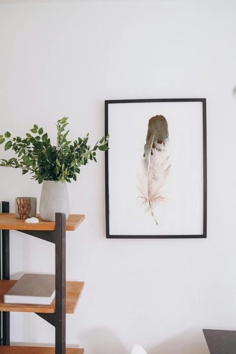 Image of a feather watercolor painting by Shayna Larsen, originals & prints available