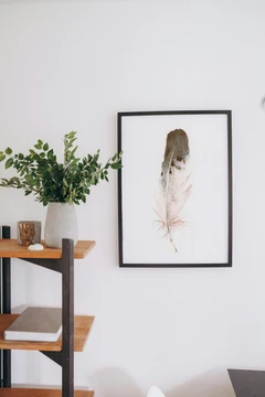 Image of a feather watercolor painting by Shayna Larsen, originals & prints available