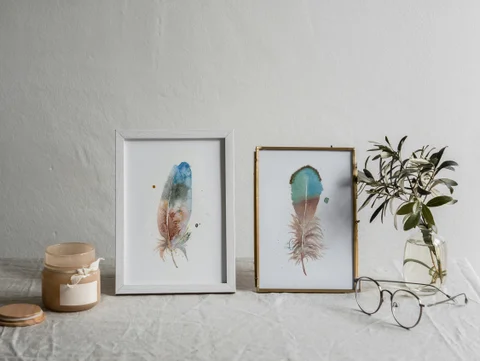 Image of a feather watercolor painting by Shayna Larsen, originals & prints available