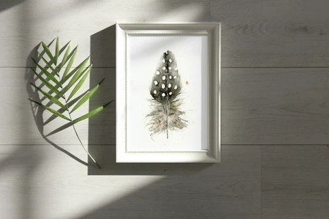 Image of a feather watercolor painting by Shayna Larsen, originals & prints available