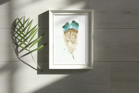Image of a feather watercolor painting by Shayna Larsen, originals & prints available