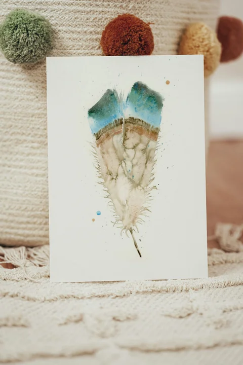 Image of a feather watercolor painting by Shayna Larsen, originals & prints available