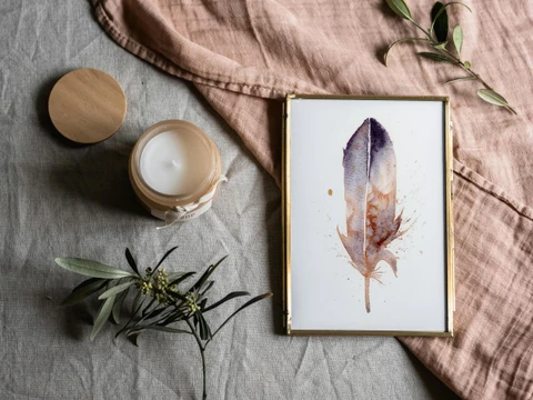 Image of a feather watercolor painting by Shayna Larsen, originals & prints available