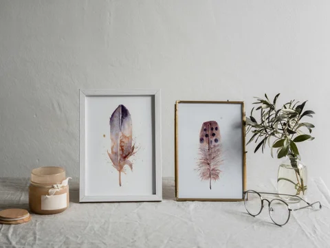 Image of a feather watercolor painting by Shayna Larsen, originals & prints available