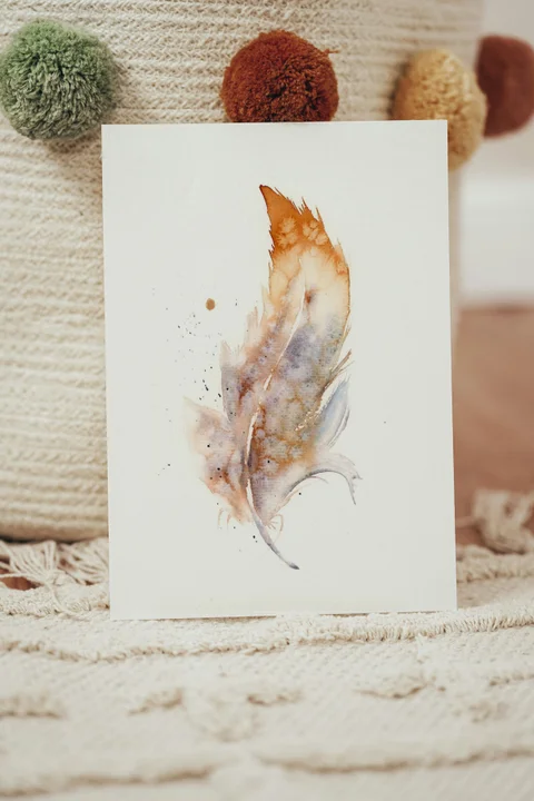 Image of a feather watercolor painting by Shayna Larsen, originals & prints available