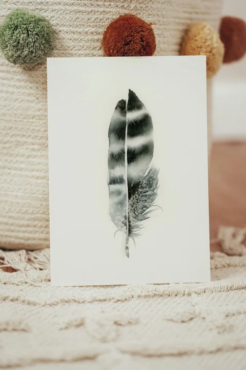 Image of a feather watercolor painting by Shayna Larsen, originals & prints available