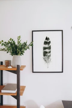 Image of a feather watercolor painting by Shayna Larsen, originals & prints available