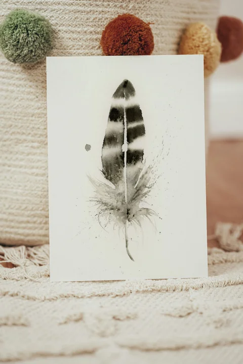 Image of a feather watercolor painting by Shayna Larsen, originals & prints available